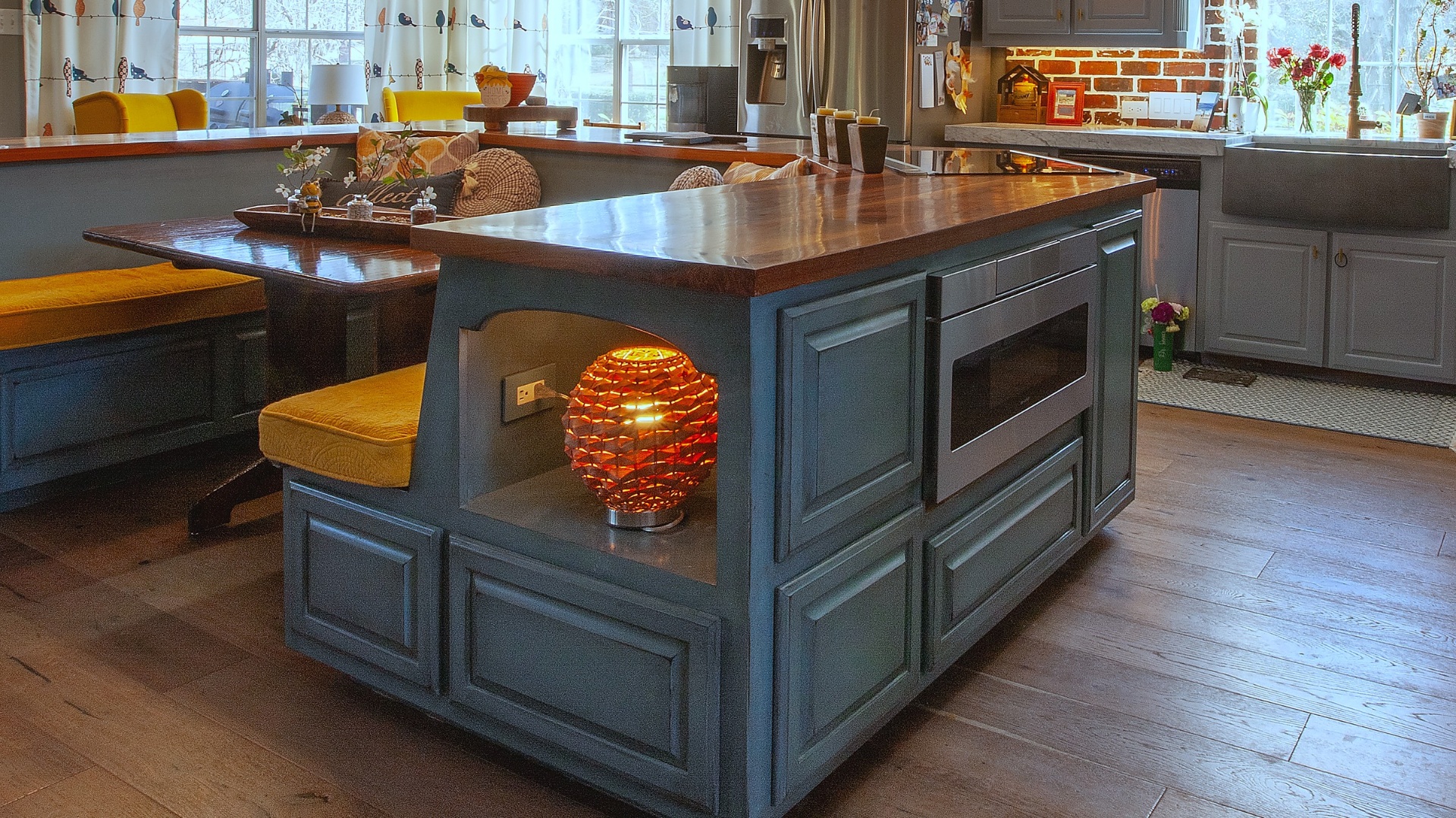 Custom kitchen island with walnut top and microwave drawer