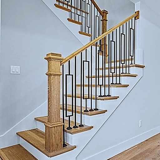 Oak Street oak staircase with iron balusters